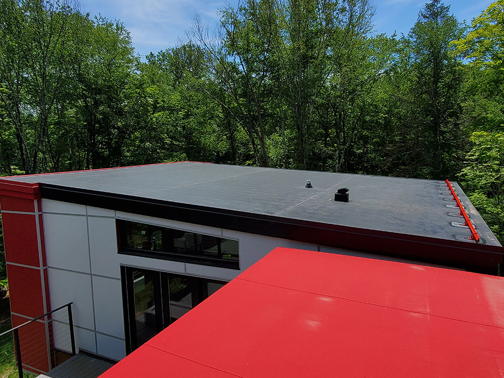 Snow retention for low-slope membrane roofs