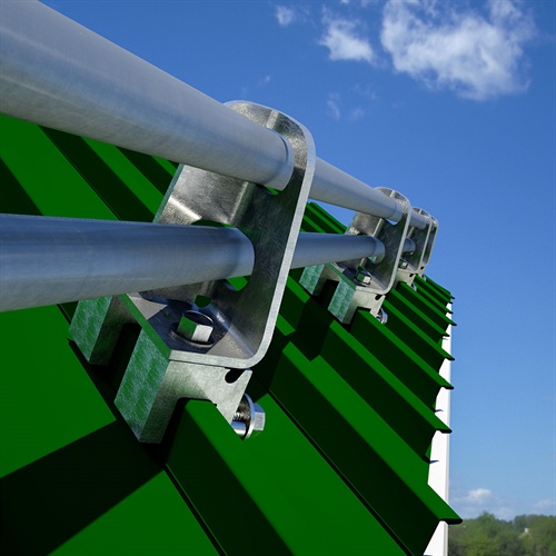 Unique design allows the snow retention system to follow the direction of the eave, but swivels to attach to the varying angles of the roof panel ribs. 