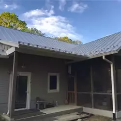 Snow bar system protecting residential walkways in South Carolina.