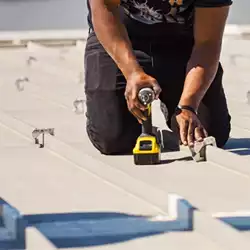 AceClamp metal roof clamps installed on standing seam roof