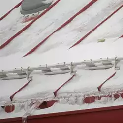 AceClamp’s snow stops for metal roofing at Water Works Car Wash	