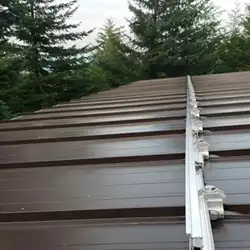 Color Snap snow rails for metal roofs