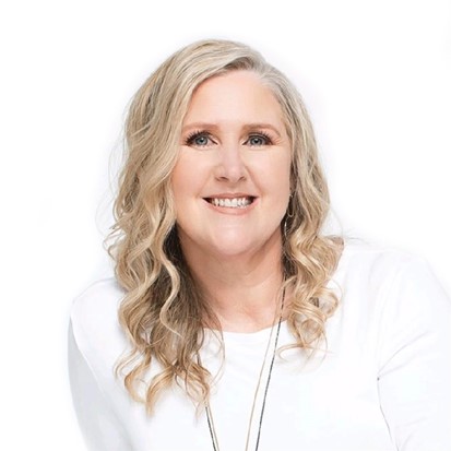 Photo shows a professional blonde haired woman, director MJ Wasley